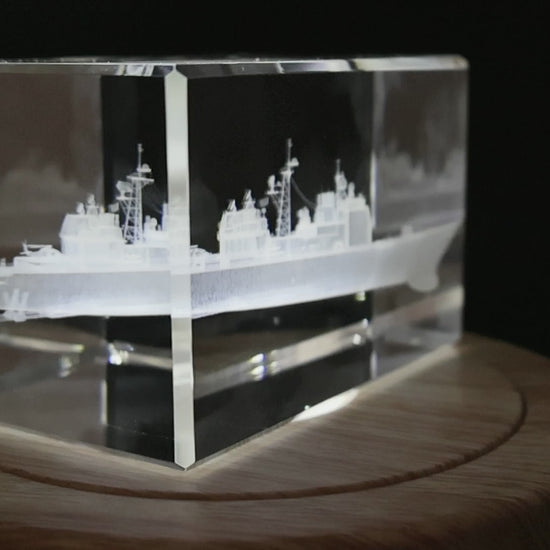 Three-quarter view showing the depth of the cruiser crystal engraving