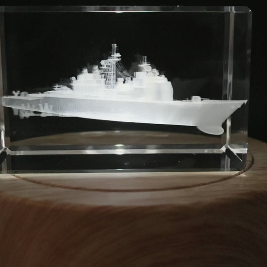 Close-up of the Ticonderoga-class cruiser engraving inside the crystal