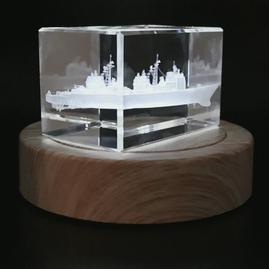 Actual cruiser crystal rotating on its illuminated wood base