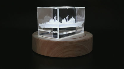 Actual cruiser crystal rotating on its illuminated wood base