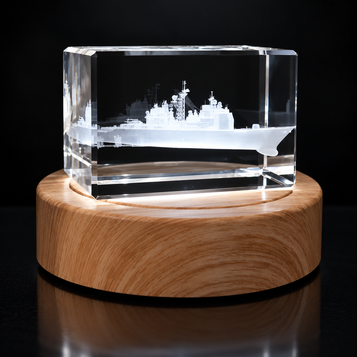 Ticonderoga-class U.S. Navy cruiser engraved inside clear crystal on its illuminated wood light base