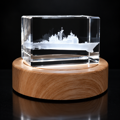 Ticonderoga-class U.S. Navy cruiser engraved inside clear crystal on its illuminated wood light base